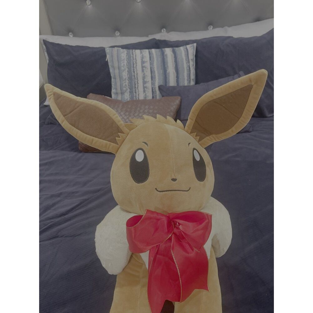 Pokémon Eevee Holiday Plush w/ Red Bow – Large Stuffed Animal